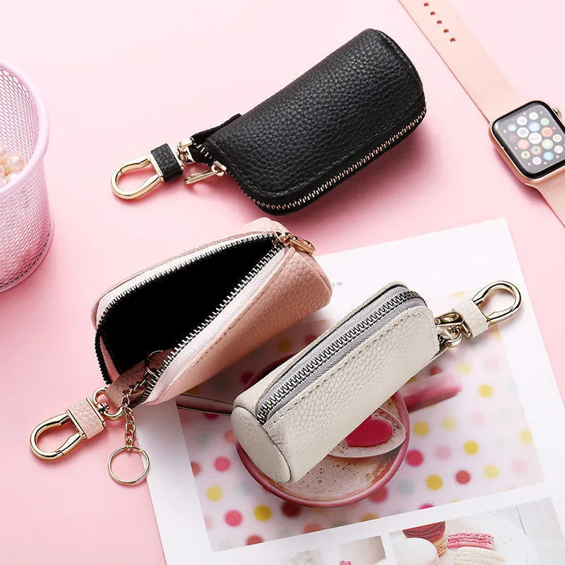 Waterproof PU leather key case in black, grey or pink with zippered expansion compartment