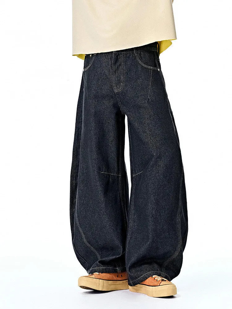 Men's wide leg denim trousers in original cow colour showing mid waist and straight leg design