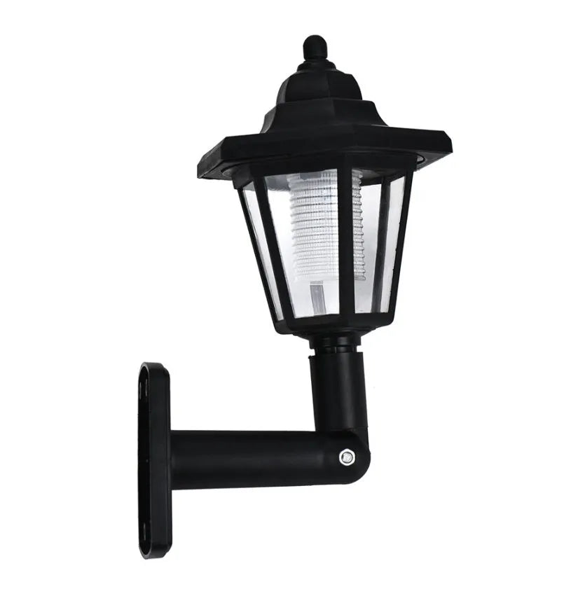 Black hexagonal solar-powered wall light with automatic sensor for outdoor garden or patio lighting