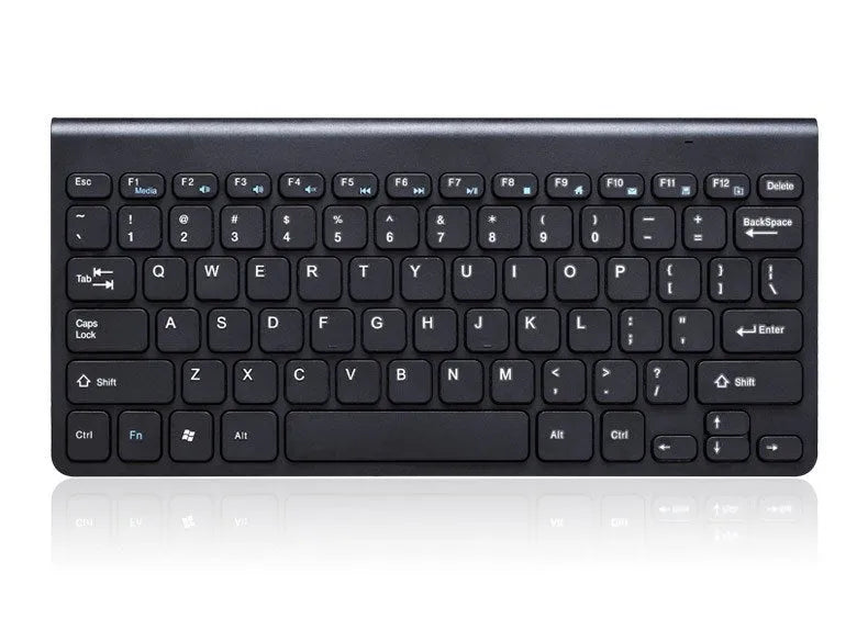 Wireless black keyboard and mouse set with 4G connectivity on wooden desk