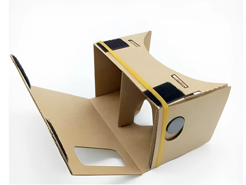 Pink and white VR cardboard glasses viewer for 6-inch smartphones with adjustable head strap.