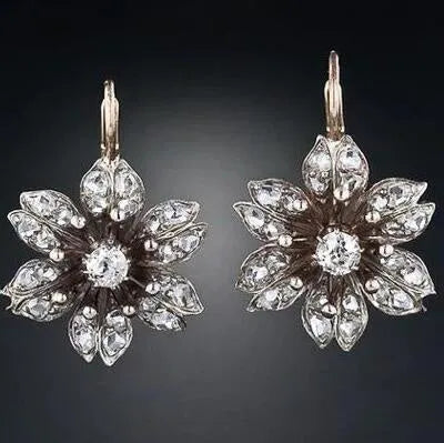 Retro style silver earrings for women with electroplated alloy construction