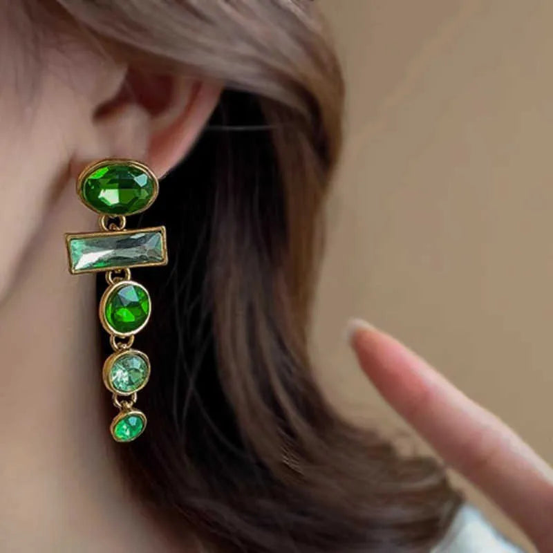 Geometric Chinese-style alloy earrings with green gradient colour, zircon inlay treatment and tassel detailing