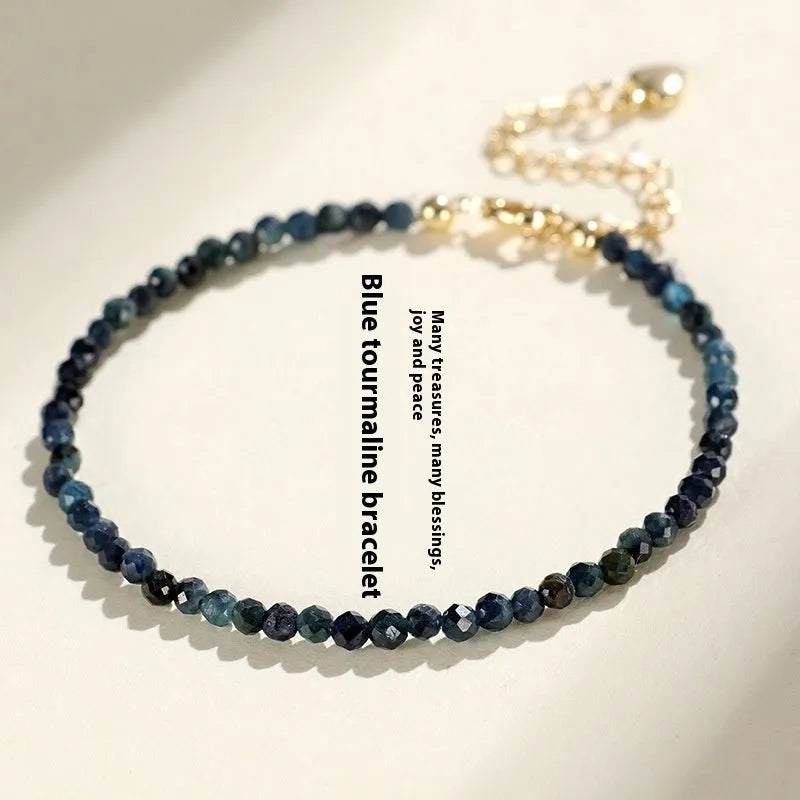 Blue tourmaline beaded bracelet with 3mm stones and spacer bead sections
