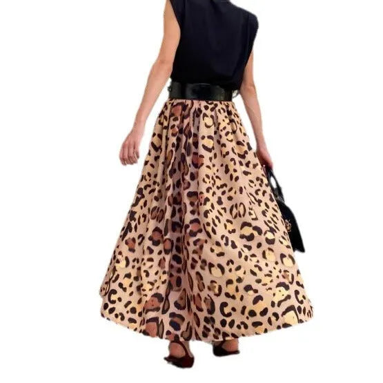 Brown leopard print women's A-line long skirt on hanger showing full length and animal pattern design