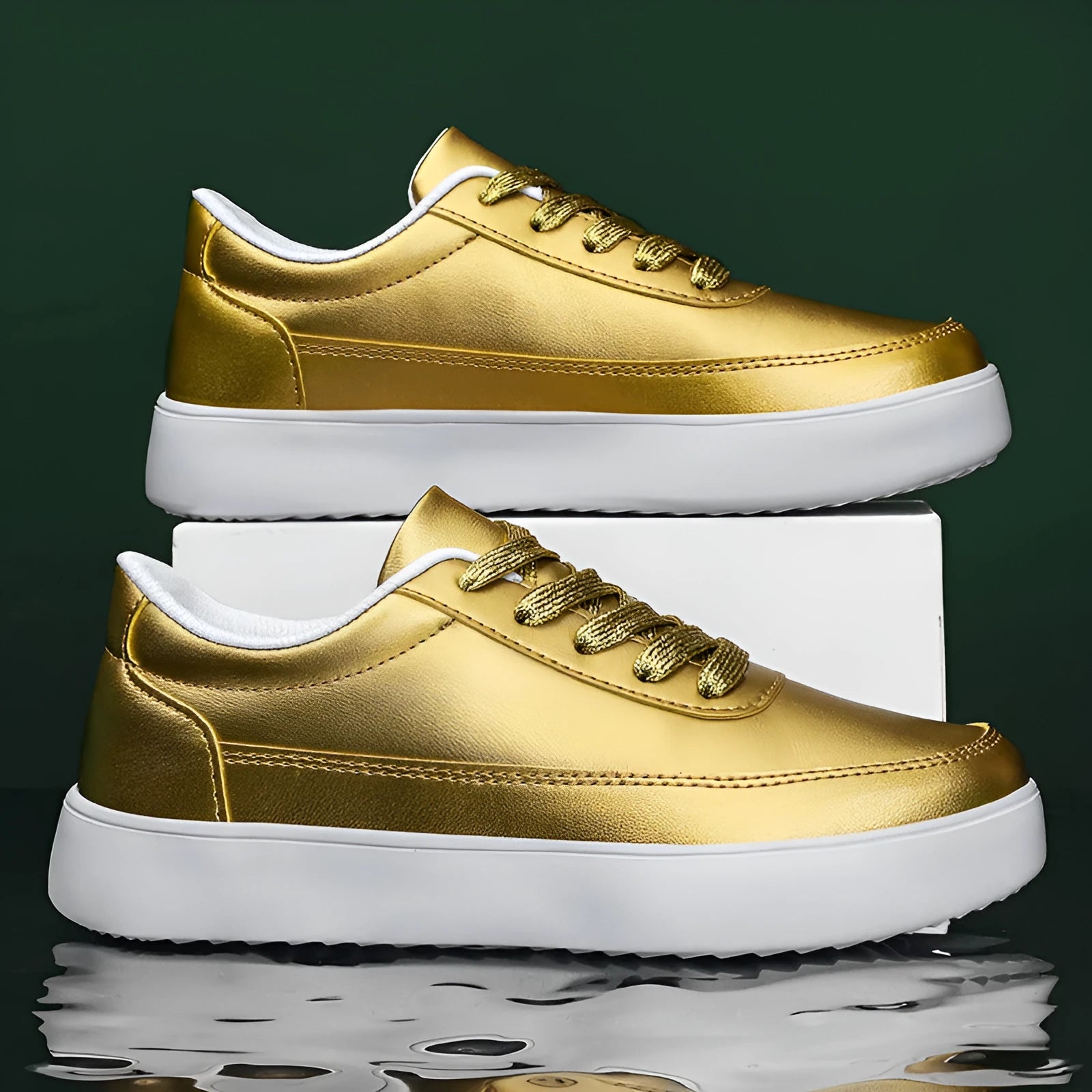 Women's gold leather lace-up flat casual shoes on a white background