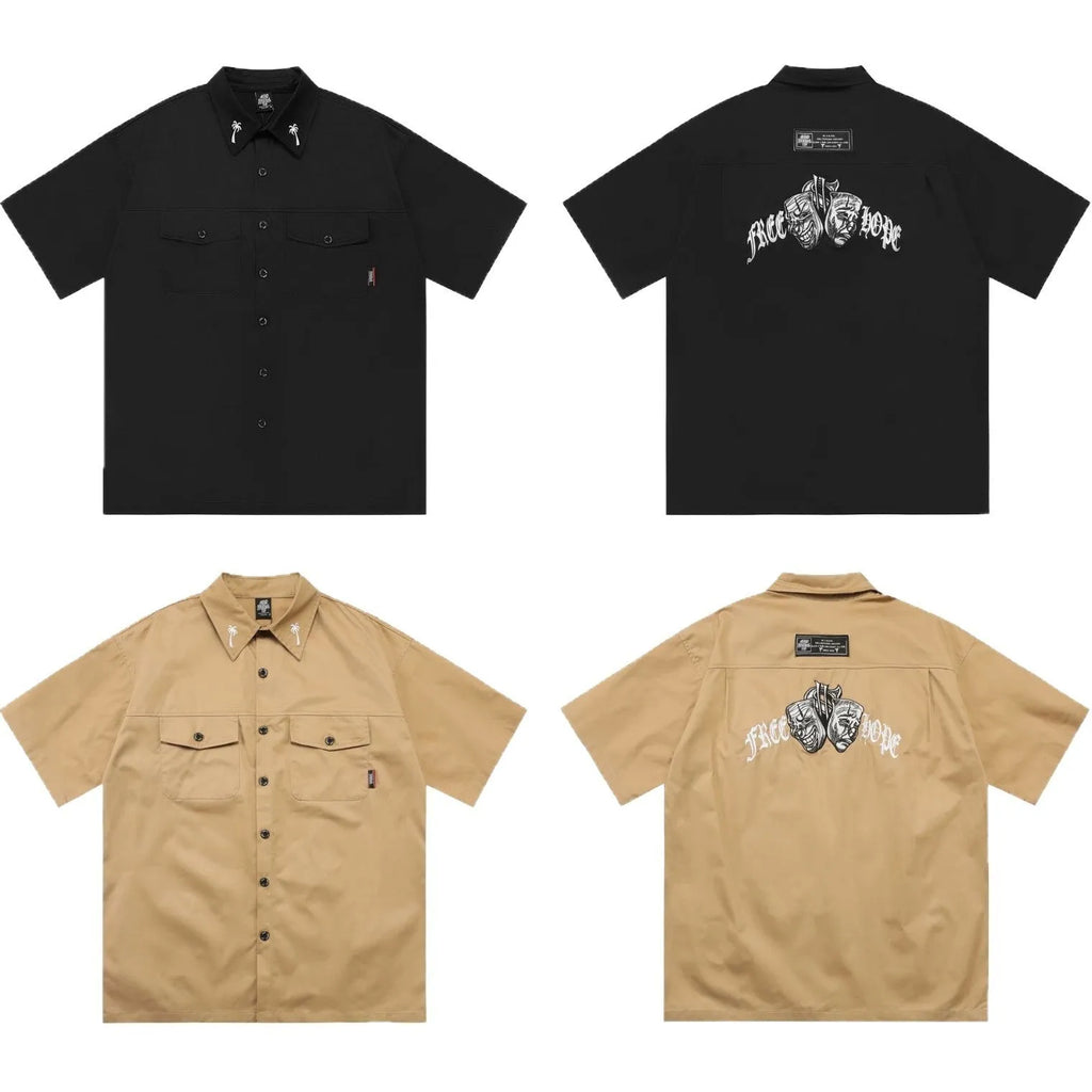 Men's loose fit black embroidered half-sleeve work shirt on a hanger.