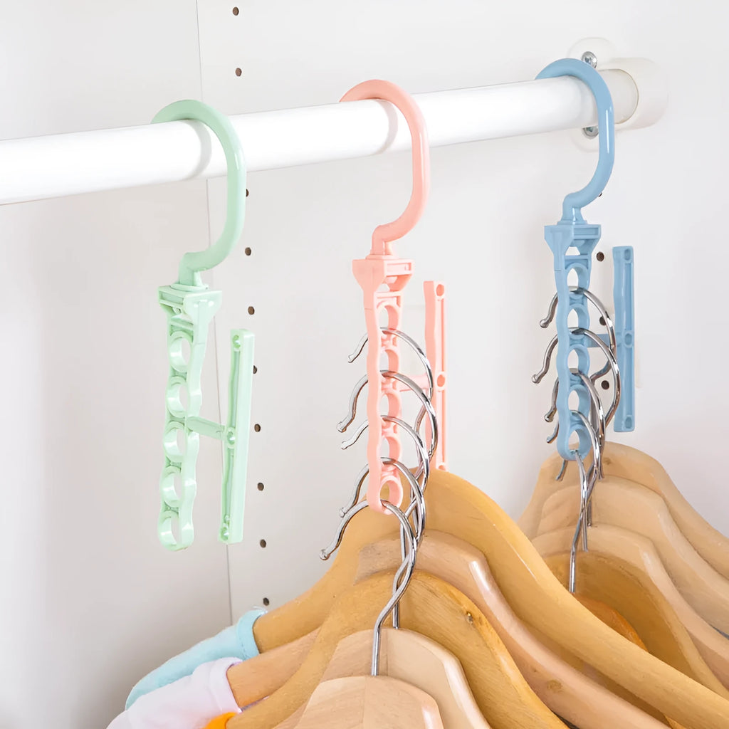 Blue revolving wardrobe hanger with five rotating branches and a central handle.