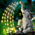 Outdoor garden elephant sculpture made from resin with integrated LED light strip for nighttime illumination