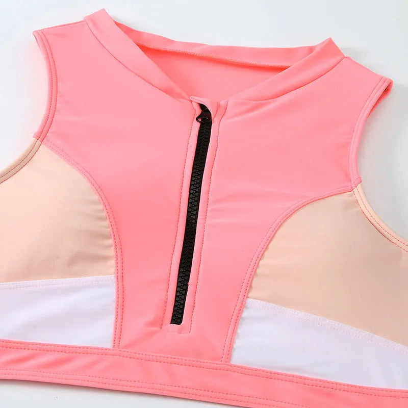 Pink high-waist women's bikini swimsuit with split briefs and mesh lining.