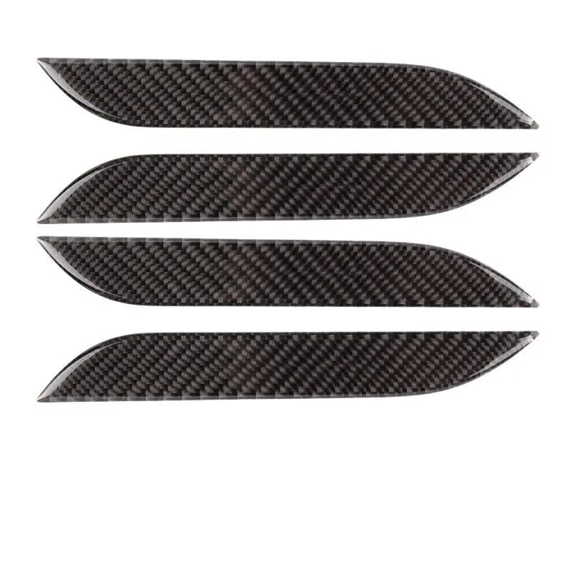 Set of four carbon fibre adhesive protection patches for Tesla Model S door handles.