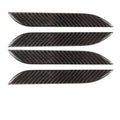 Set of four carbon fibre adhesive protection patches for Tesla Model S door handles.