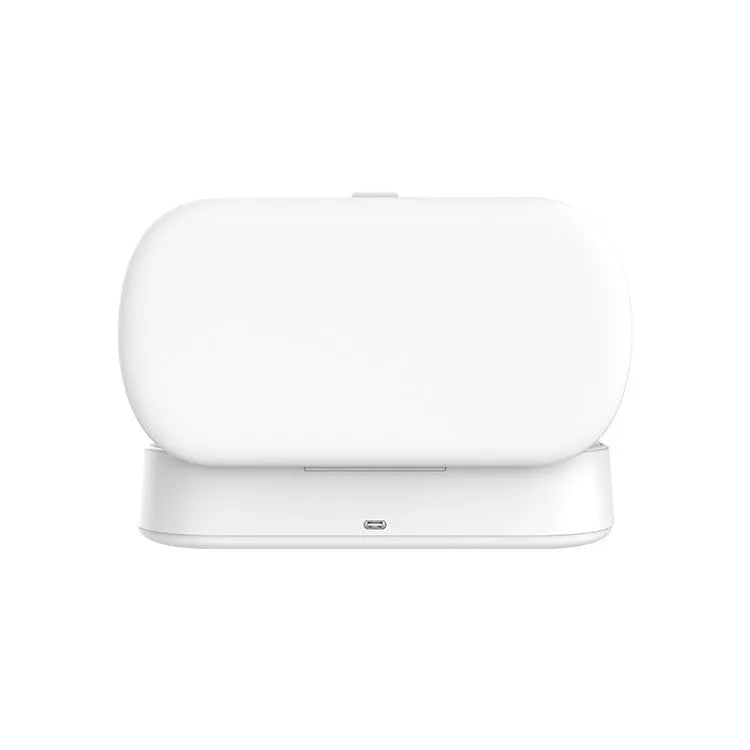 White ABS plastic UV steriliser and wireless charging box for phones and small items.