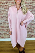 Women's solid colour loose knitted dress with raglan sleeves and a front zip closure.