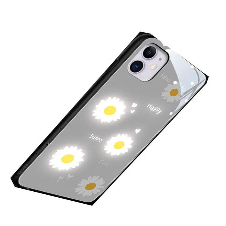 White luminous iPhone case with painted purple daisies and voice-activated colour light feature.