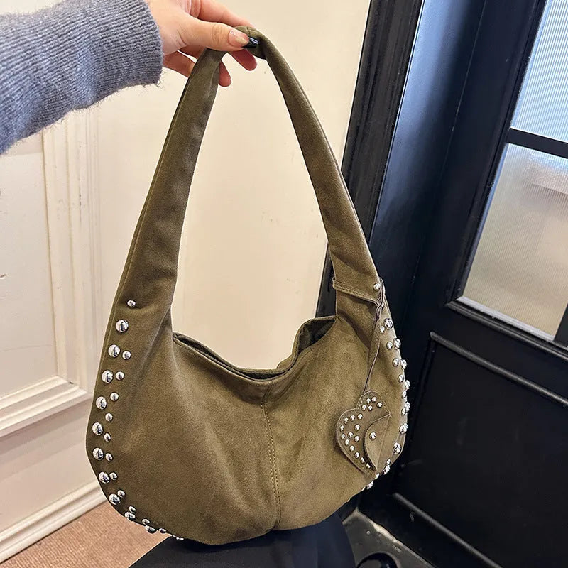 Soft plush retro tote handbag in strapless underarm design showing available colour options