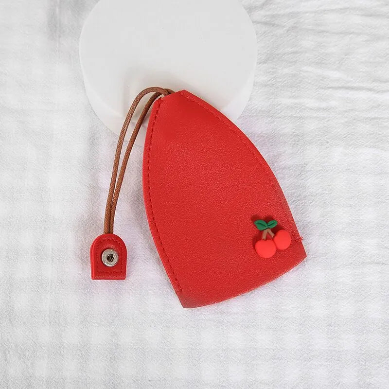 Cartoon pull-out key case in PU leather measuring 14 by 7.5 centimetres