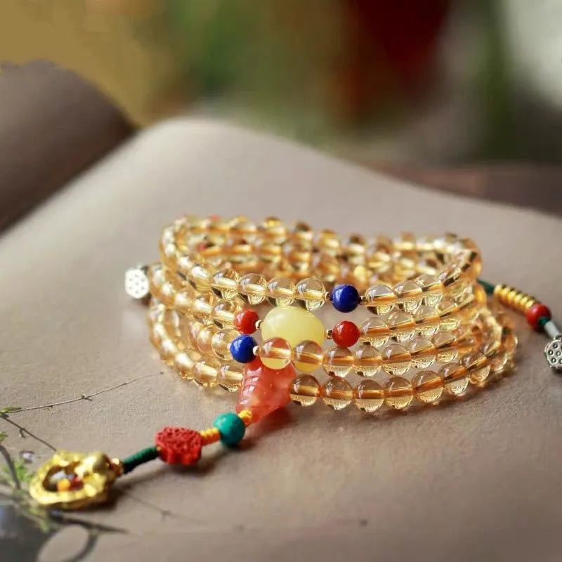 Natural citrine bracelet with 1mm yellow beads on filament string, light luxury style