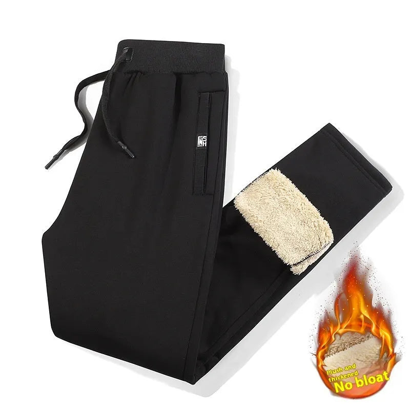 Men's grey fleece-lined cotton track pants with oversized fit and straight leg design