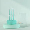 Soft silicone pet toothbrush for dogs and cats in purple, blue, and green colours with curved handle