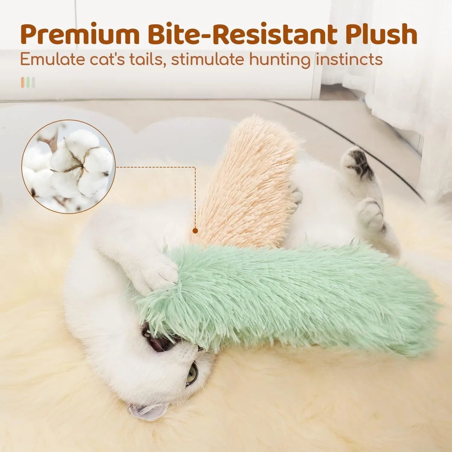 Blue, green, pink, and white plush cat toy pillow measuring 27 by 10 centimetres.