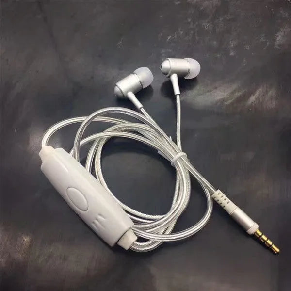 Blue Magic Light LED earphones with glowing stems, 3.5mm plug, and inline remote on a dark background.