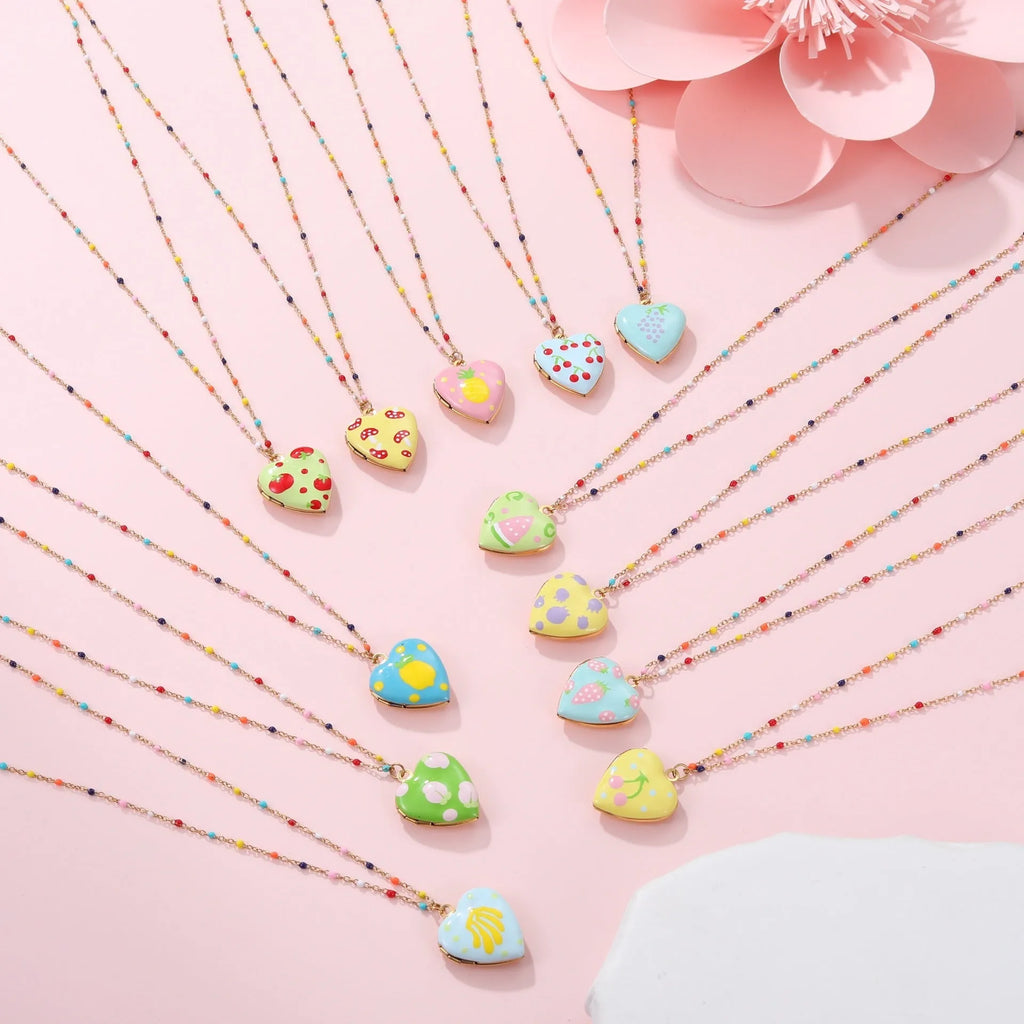 Gold-plated stainless steel necklace with fruit-shaped pendant on adjustable chain