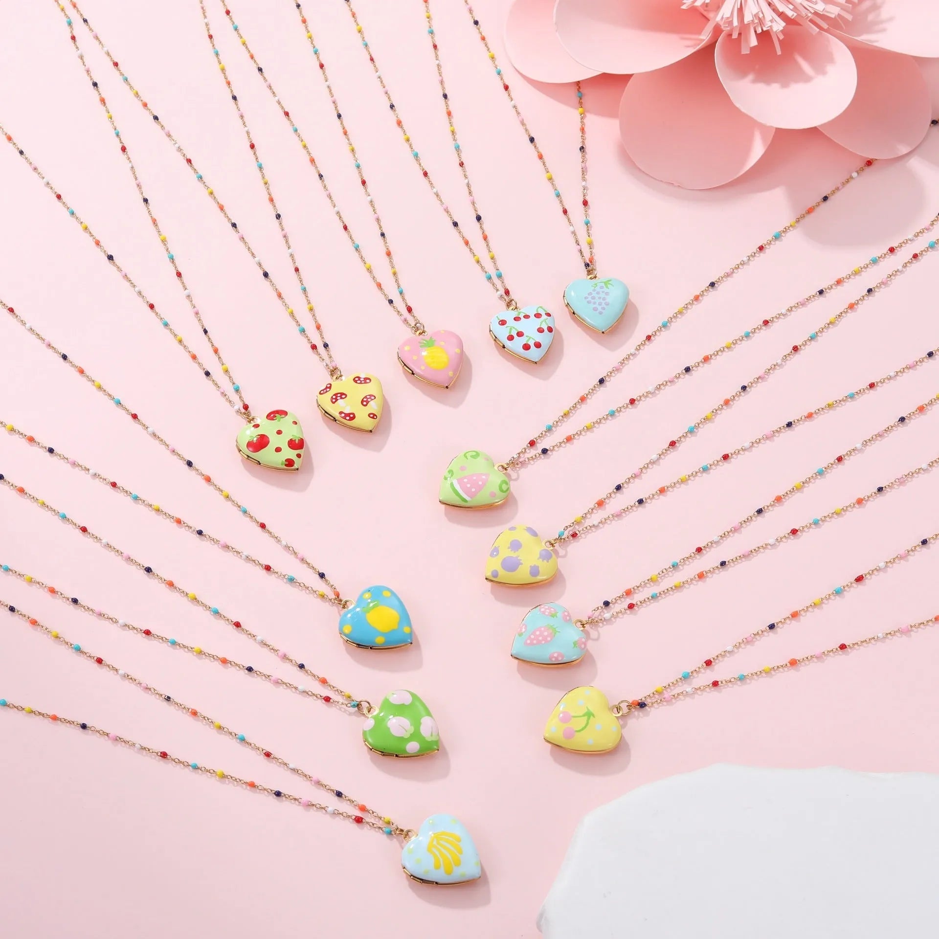 Gold-plated stainless steel necklace with fruit-shaped pendant on adjustable chain