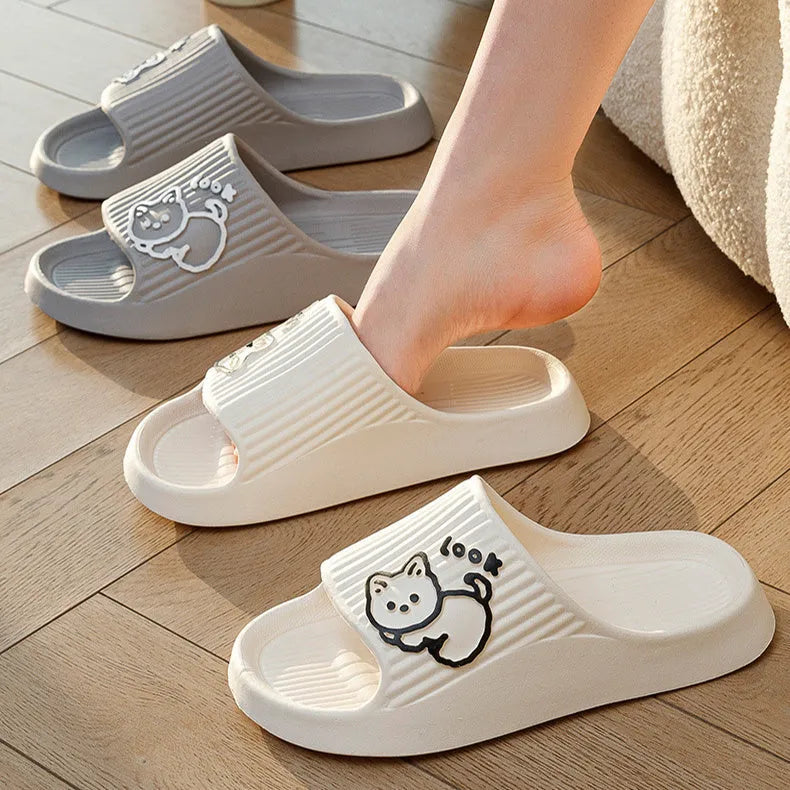 Green EVA foam cat slippers with thick platform sole and anti-slip pattern.