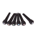 Six solid ebony guitar string nails with matt black finish for folk acoustic guitars.