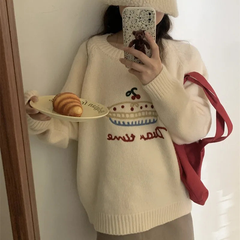 Women's loose fit round neck embroidered cartoon sweater in beige with long sleeves and acrylic spandex fabric
