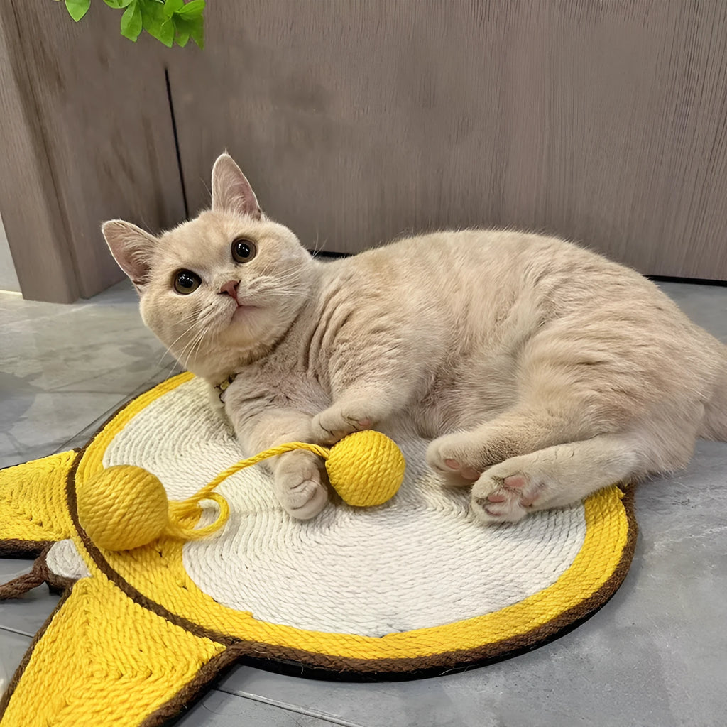 Yellow corgi-butt design sisal cat scratching pad with anti-slip base, shown with adhesive hooks.