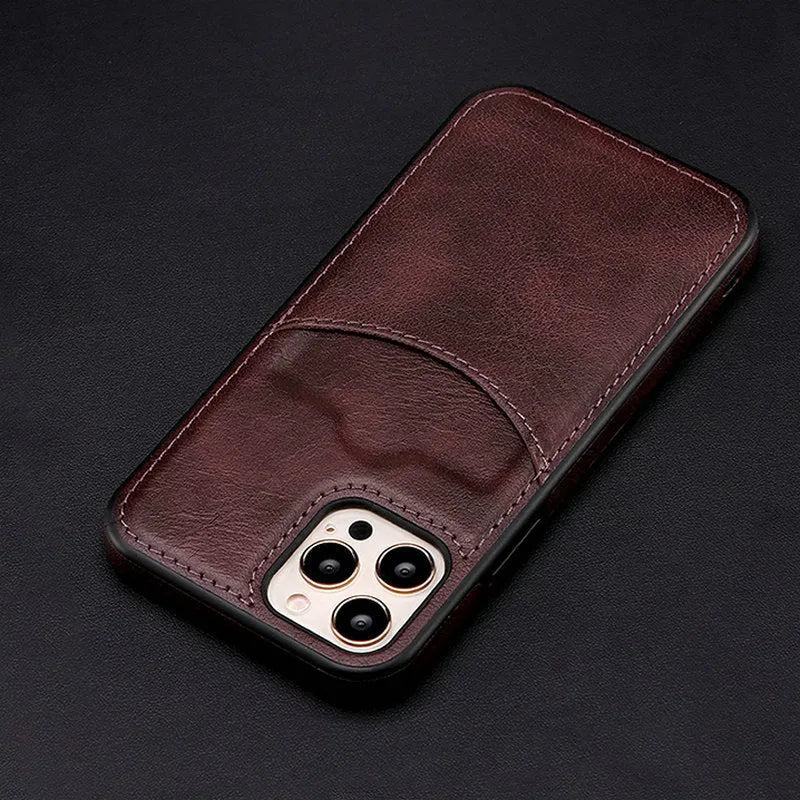 Dark blue PU leather protective case for various iPhone models on a table.