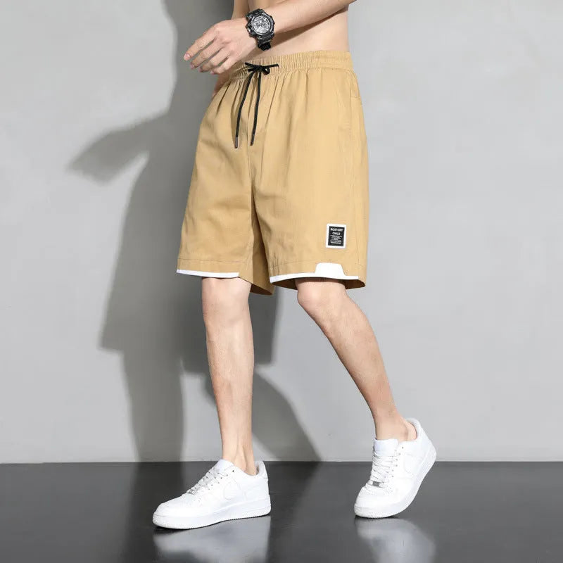 Boys plus size cotton shorts in black, khaki or white, showing mid-waist and shorts length design.