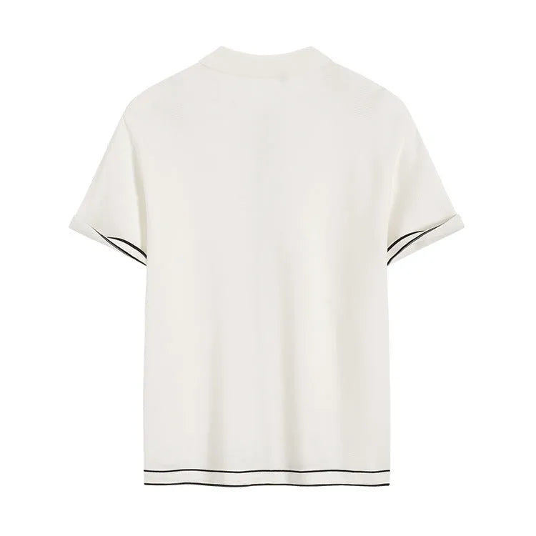 White short sleeve women's cardigan with dark contrast colour lapels laid flat.
