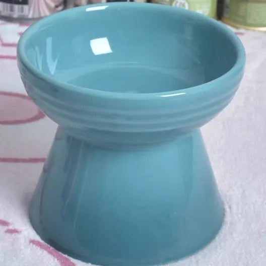Black ceramic pet bowl with chin-high foot and neck protector anti-tumble design for cats and dogs