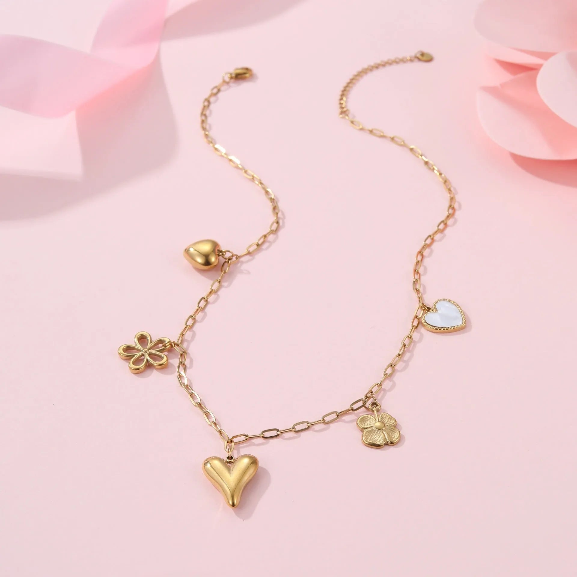 Stainless steel necklace with geometric heart and ribbon sun pendant on adjustable 41-50cm chain
