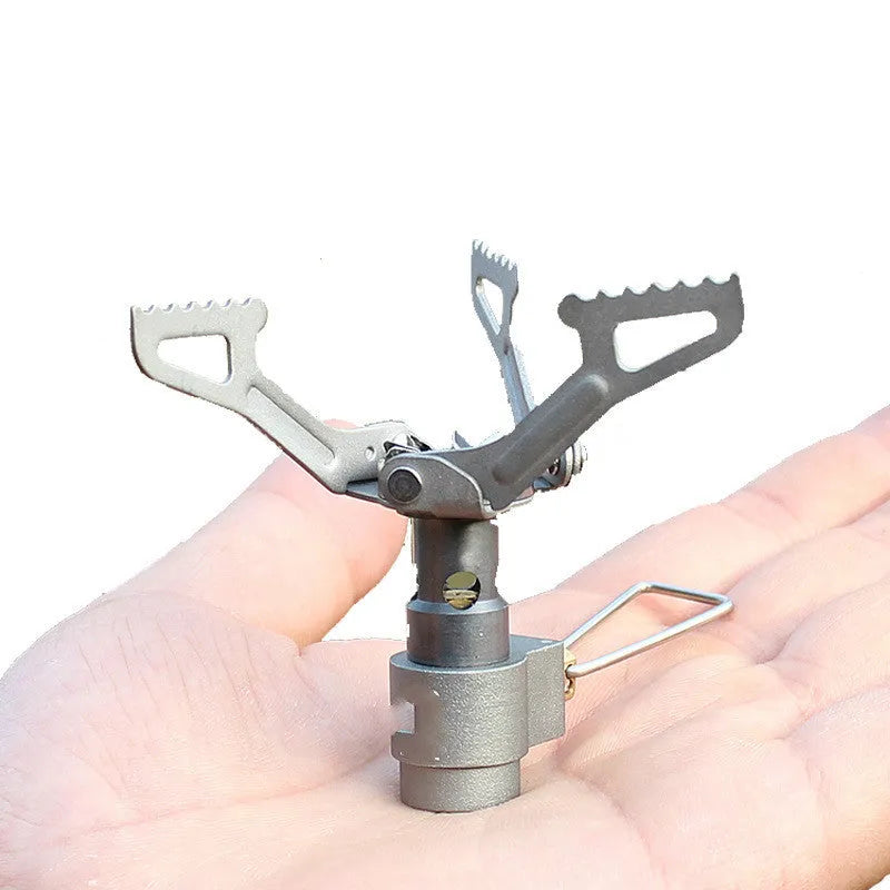 Portable one-piece propane gas camping stove for outdoor use.