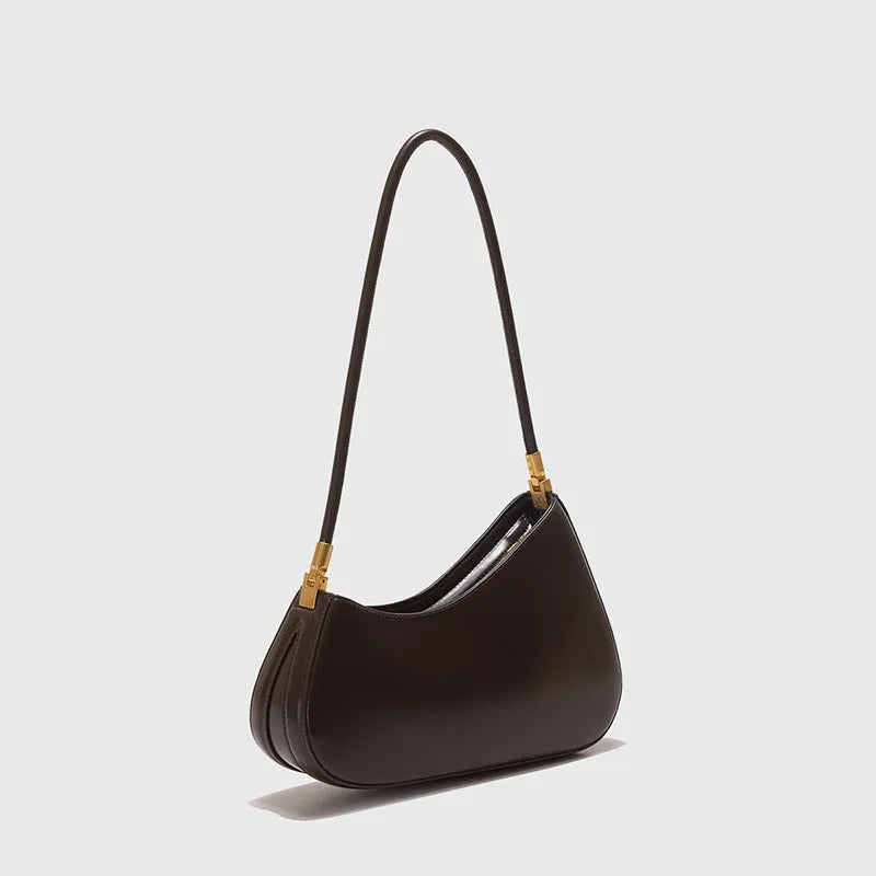 Retro oval women's underarm bag in PU leather with single shoulder strap shown in multiple colour options