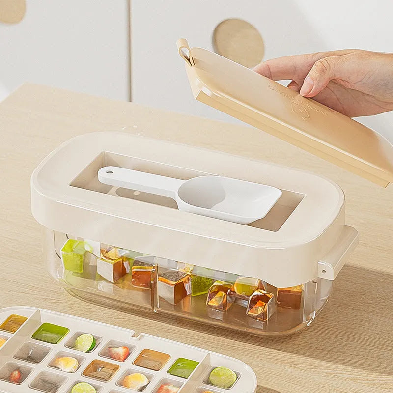 Yellow high-capacity grid ice cube tray with integrated storage slot for an ice shovel