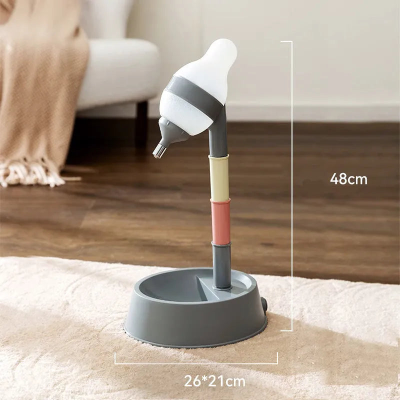 Green adjustable standing pet water dispenser with detachable pole and separate bowl on a stable base.