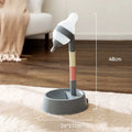 Green adjustable standing pet water dispenser with detachable pole and separate bowl on a stable base.