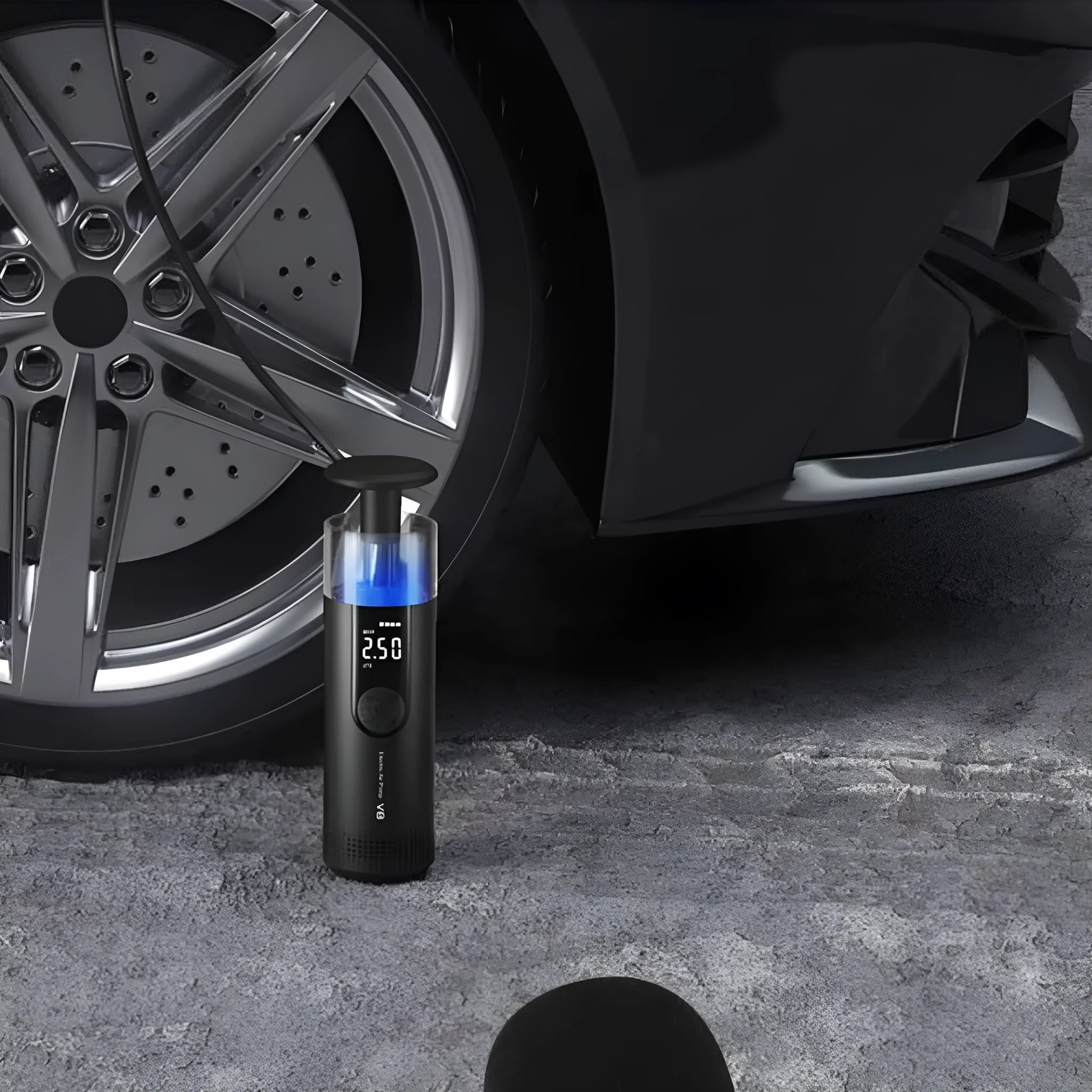 Black electric tyre pump with digital display and long hose for car and bicycle inflation