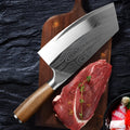 Stainless steel kitchen knife with a 320mm blade on a wooden cutting board.