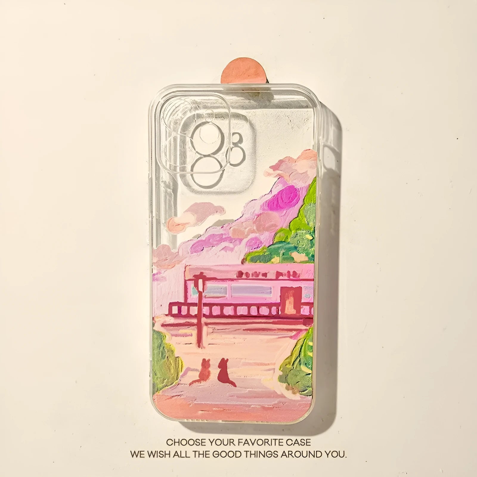 Soft silicone iPhone case with a colourful cartoon print of two cats on the back.