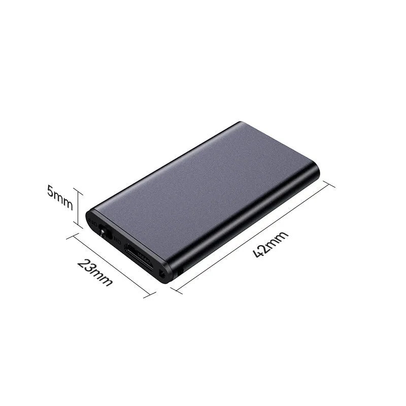 Silver encryption recording pen with English micro-interface, shown next to a notepad.