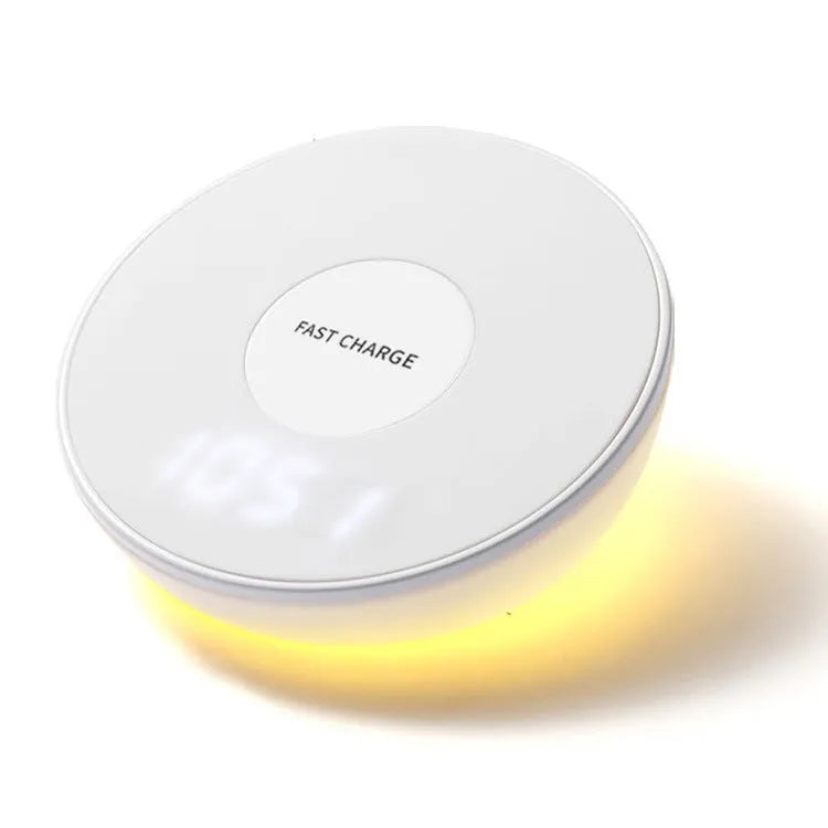 White slim QI wireless charger with LED clock display for mobile phones.