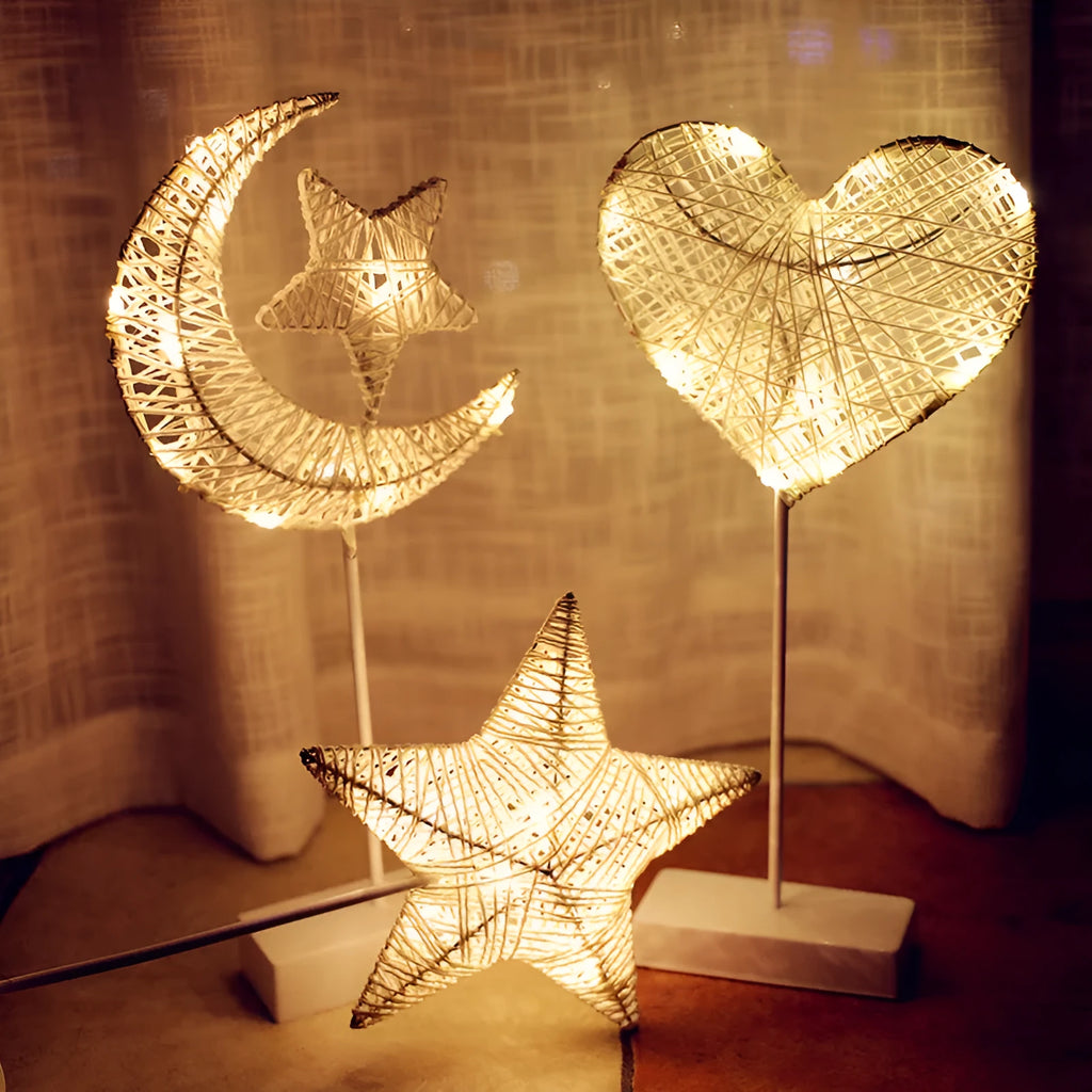 Rattan and PC LED star, heart, and moon shaped battery operated decorative lamps.