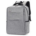 Waterproof rechargeable laptop backpack in multiple colours, shown with a 15.6 inch laptop in its padded compartment.