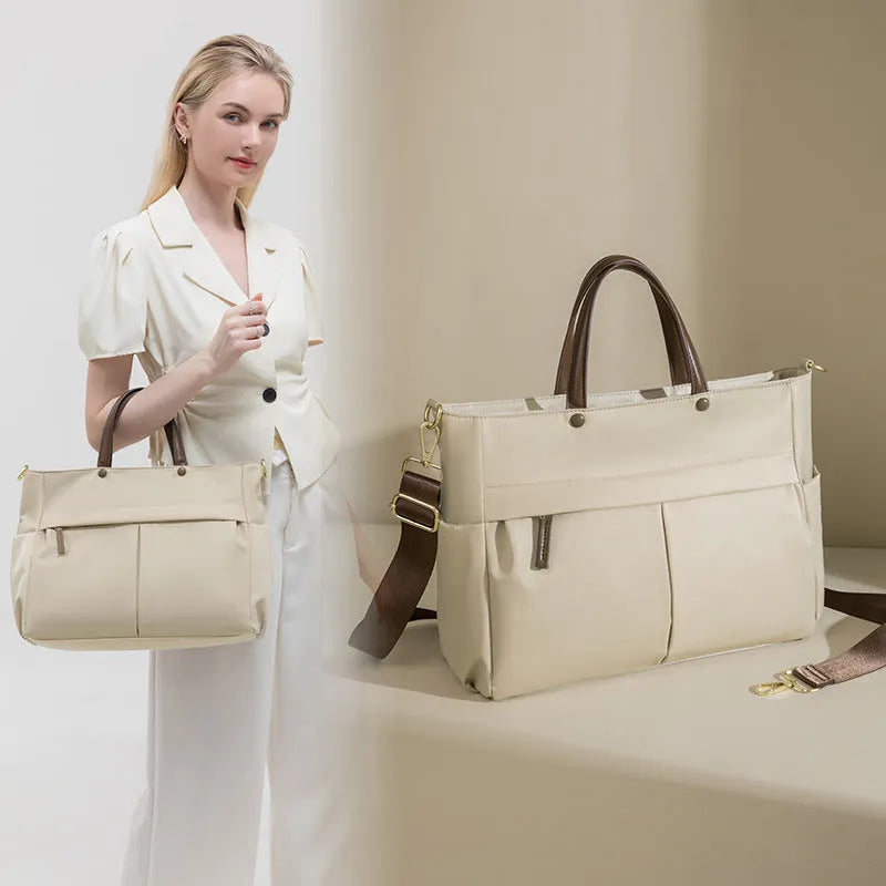 Women's Oxford cloth laptop bag in elegant black or nuts and apricots colours with contrast stitching